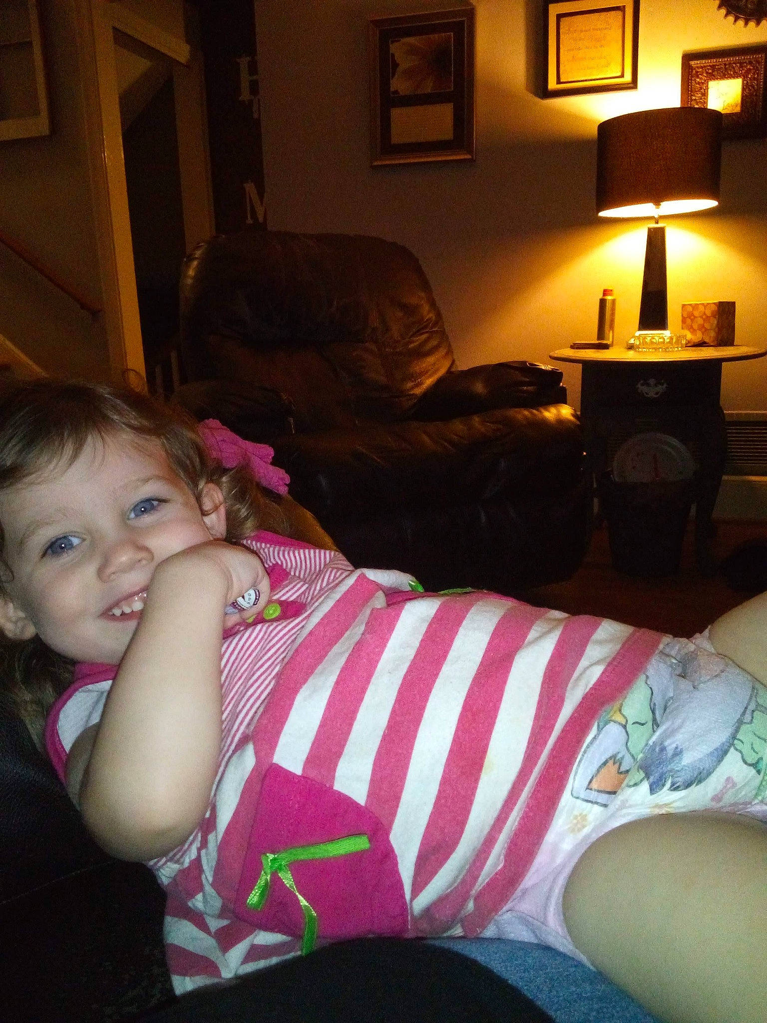 Juliette joined the competition — help win amazing prizes! arm, cheek, child, electronic_device, fun, furniture, joy, leg, lighting_accessory, person, room, sitting, smile, toddler