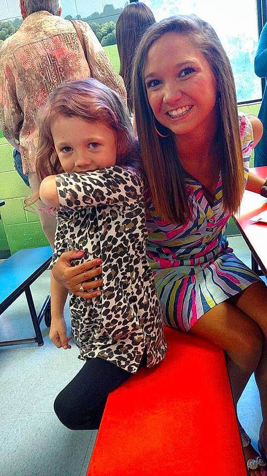 Anna Claire is registered to the contest to win money with this photo: child, daughter, fun, joy, leg, leisure, long_hair, people, person, sitting, smile, summer, thigh, toddler, vacation