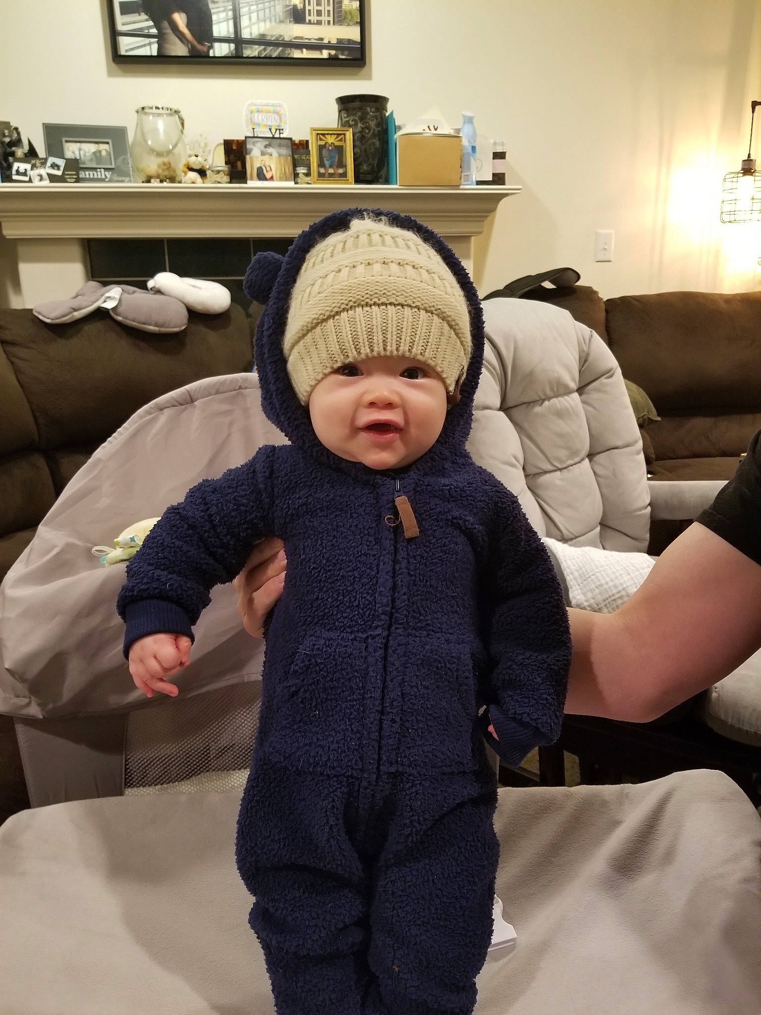 Killian is registered to the contest to win money with this photo: beanie, cap, child, cool, headgear, infant, knitting, material, outerwear, person, product, textile, toddler, wool