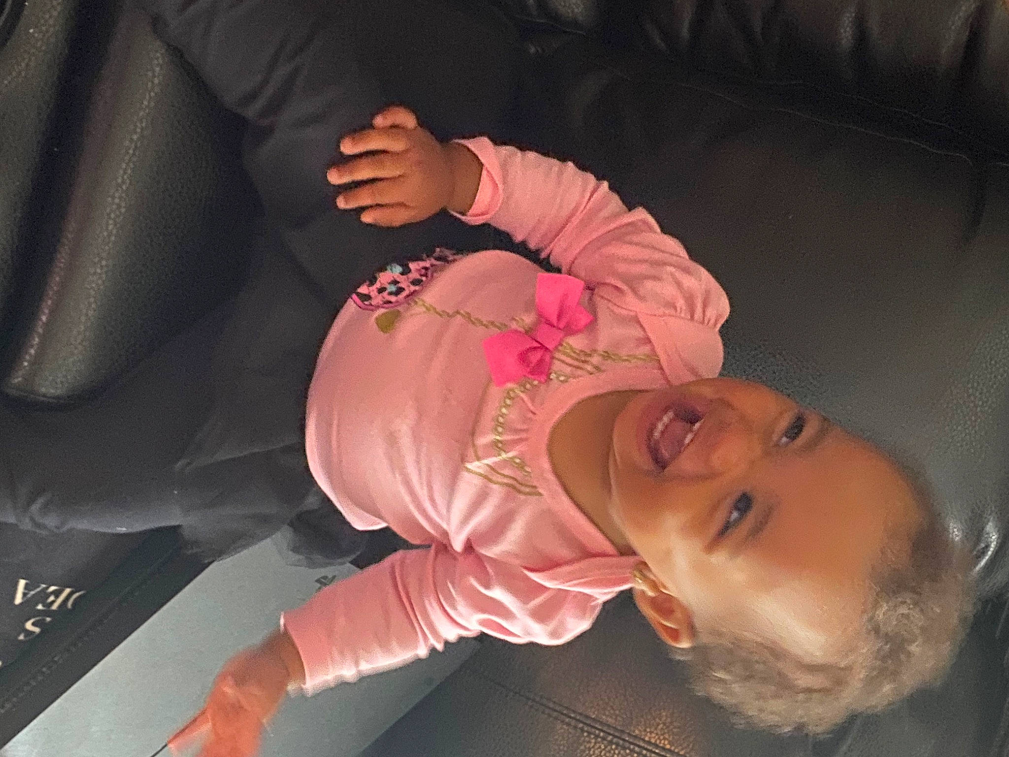 Kamiyah is registered to the contest to win money with this photo: abdomen, auto_part, baby, baby_products, car_seat, cheek, child, comfort, family_car, fun, happy, lap, mouth, person, sitting, smile, thigh, toddler, tree, vehicle_door
