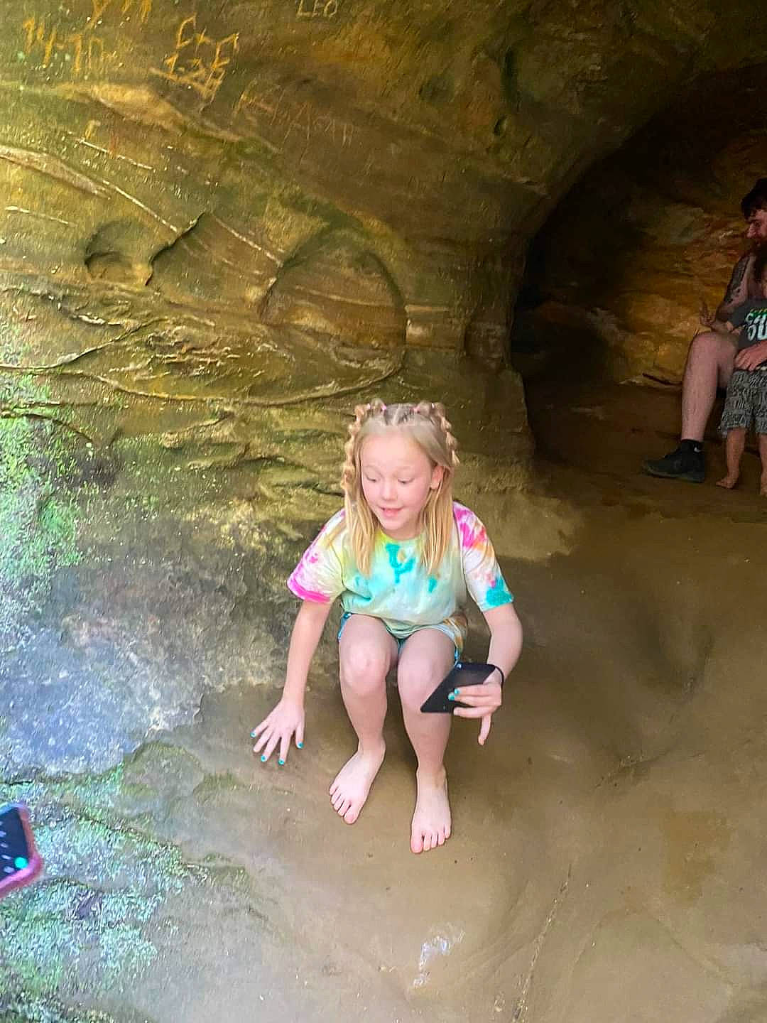 Roxie joined the competition — help win amazing prizes! barefoot, beauty, body_of_water, cave, child, erosion, foot, formation, fun, happy, leg, leisure, people_in_nature, person, recreation, rock, sand, smile, summer, toddler
