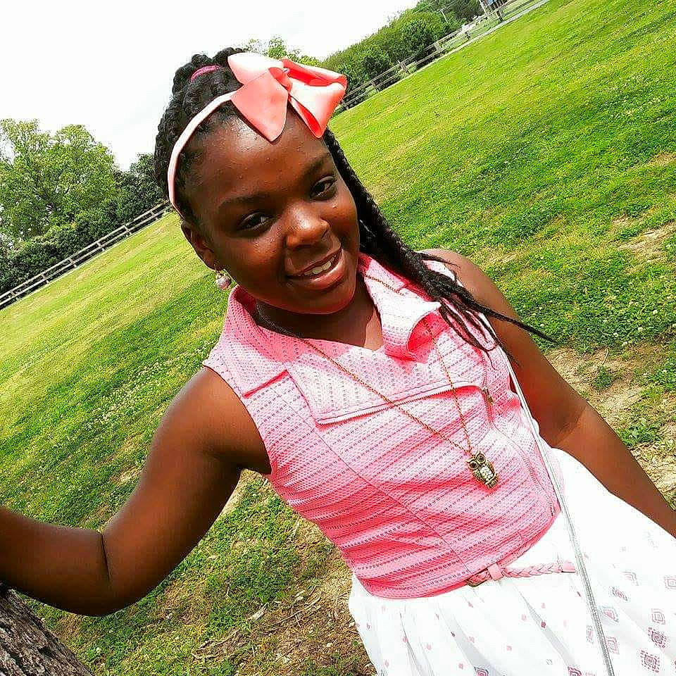 Kezia is registered to the contest to win money with this photo: beauty, black_hair, child, cool, emotion, face, facial_expression, fashion_accessory, fun, girl, grass, happiness, headgear, joy, person, pink, plant, skin, smile, summer