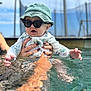 Ezio a rejoint le concours — aidez-le/la à gagner de superbes lots ! baby, child, sunglasses, hat, pool, water, swimming, hand, tattoo, nail_polish, person, outdoor, summer, sunlight, playing, clothing, cute, fun, reflection, relaxation