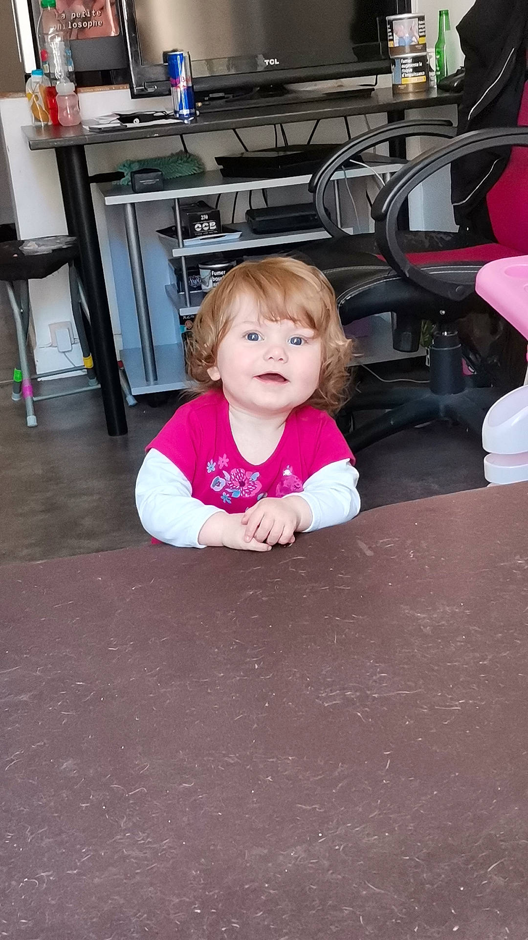 Mavie participe au concours pour gagner de l'argent avec cette photo : baby_toddler_clothing, cabinetry, child, floor, flooring, fun, hardwood, home_appliance, kitchen, kitchen_appliance, leisure, magenta, person, pink, refrigerator, road_surface, sitting, skin, standing, toddler