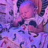 Donovan joined the competition — help win amazing prizes! baby, sleeping, infant, child, portrait, indoors, blanket, footprints, baby_seat, animal_print, purple_lighting, closed_eyes, peaceful, sitting, clothing, head, face, nursery, cozy, photography