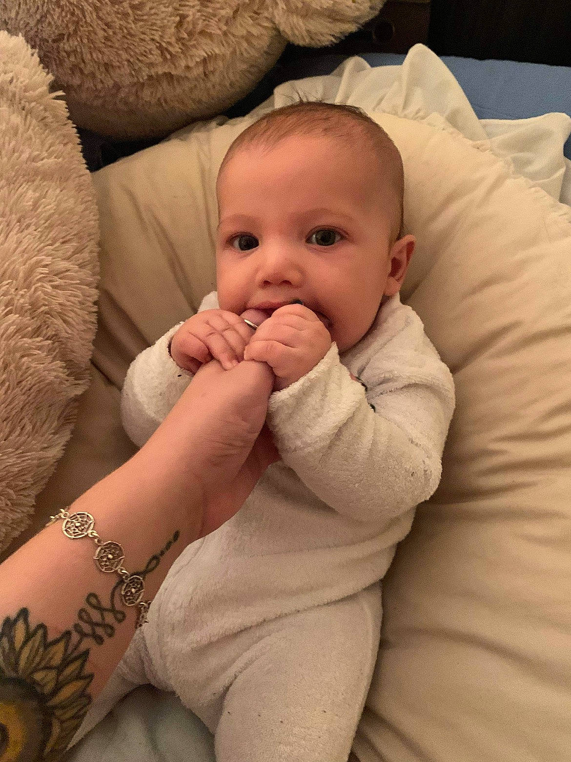 Mateo joined the competition — help win amazing prizes! baby, baby_toddler_clothing, comfort, elbow, eye, finger, gesture, hand, head, human_body, linens, lip, mouth, neck, nose, person, skin, sleeve, thumb, toddler