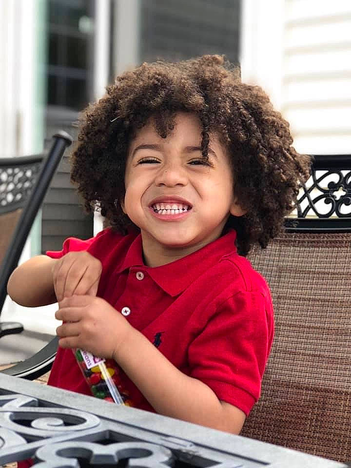 Dre is registered to the contest to win money with this photo: cheek, child, face, facial_expression, fun, hair, hairstyle, happy, joy, laugh, person, play, smile, t_shirt, toddler, vacation