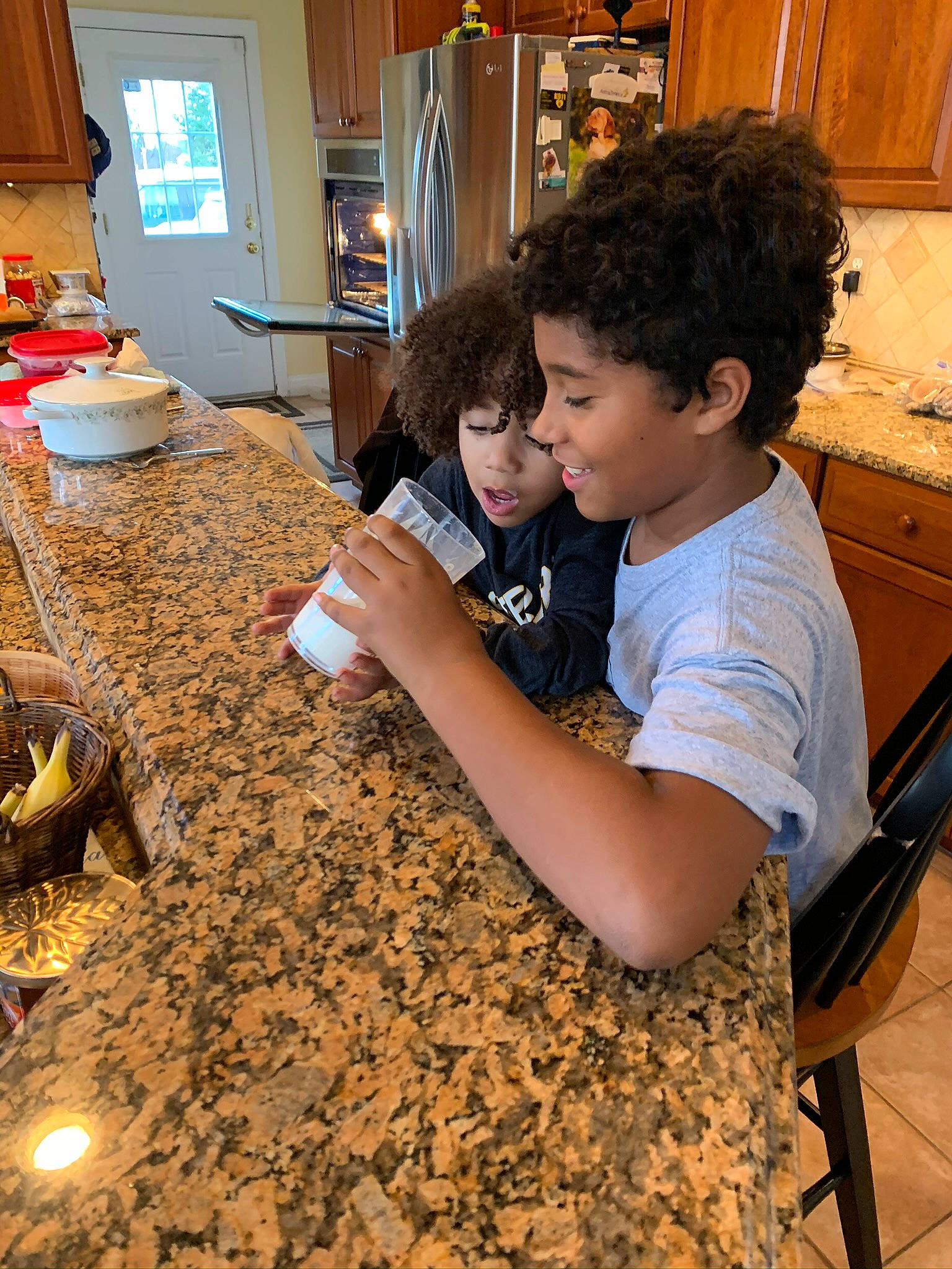 Markus is registered to the contest to win money with this photo: child, countertop, floor, flooring, fun, person, play, room, wood