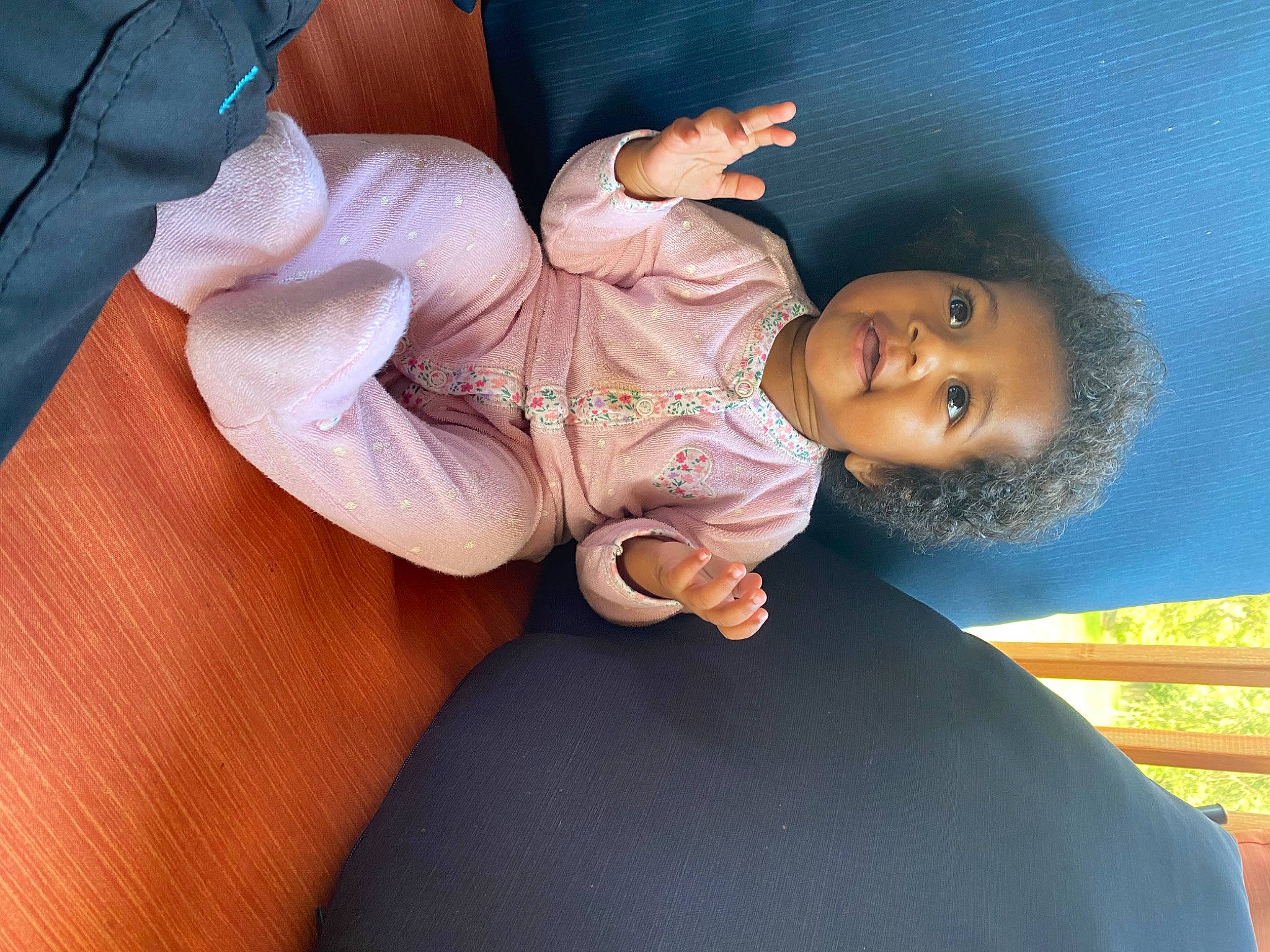 Kaida is registered to the contest to win money with this photo: arm, baby, black_hair, comfort, cool, dress, elbow, eye, finger, gesture, happy, human_body, mouth, neck, nose, person, skin, smile, thigh, toddler