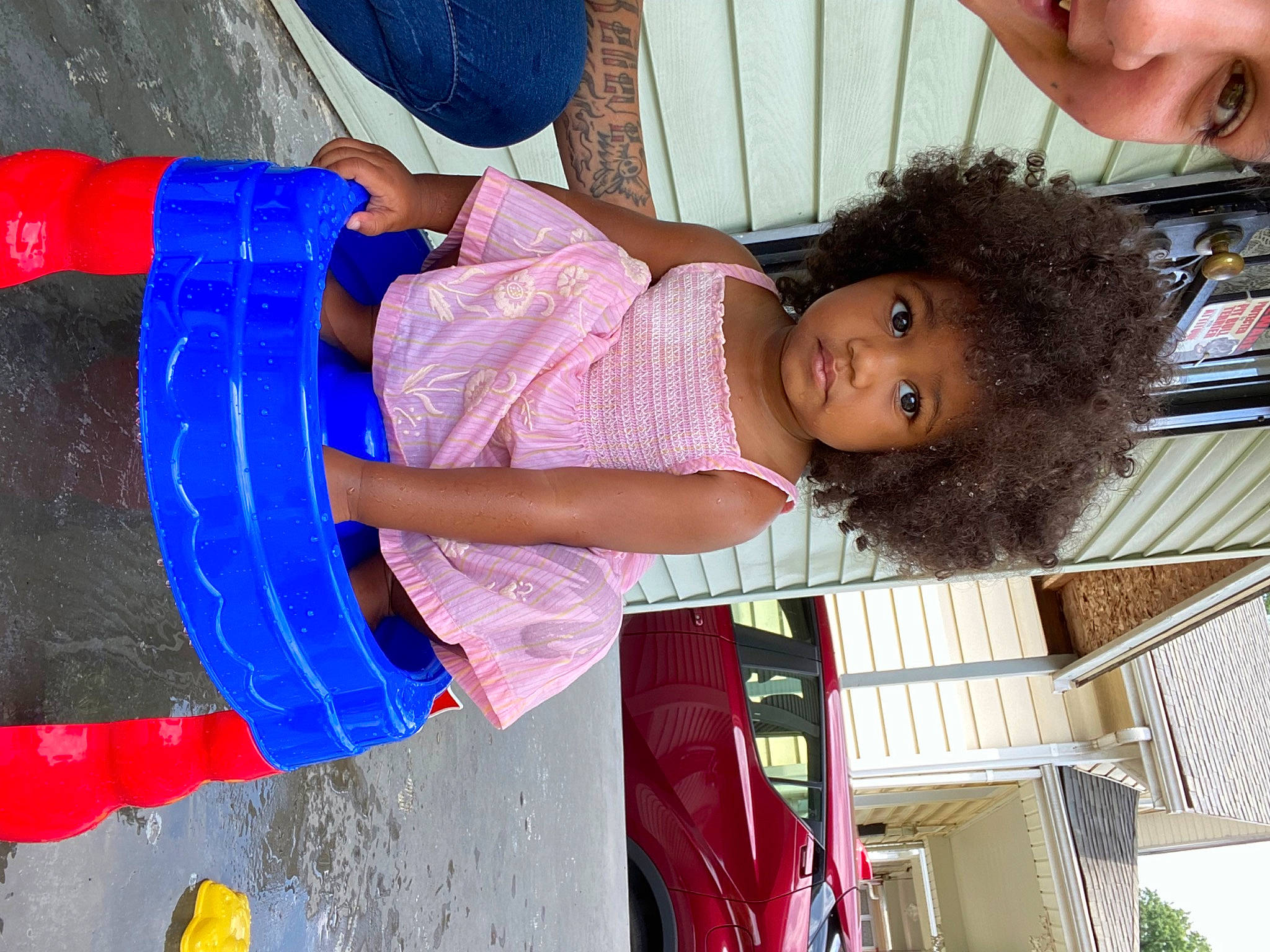 Kaida is registered to the contest to win money with this photo: blue, child, electric_blue, event, fun, happy, hat, leisure, magenta, pattern, person, sun_hat, tire, toddler, vacation