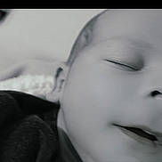 Briian'S participe au concours pour gagner de l'argent avec cette photo : baby, sleeping, closeup, black_and_white, infant, face, peaceful, soft_focus, portrait, child, newborn, calm, rest, young, cute, expression, mouth, eyes_closed, skin, head