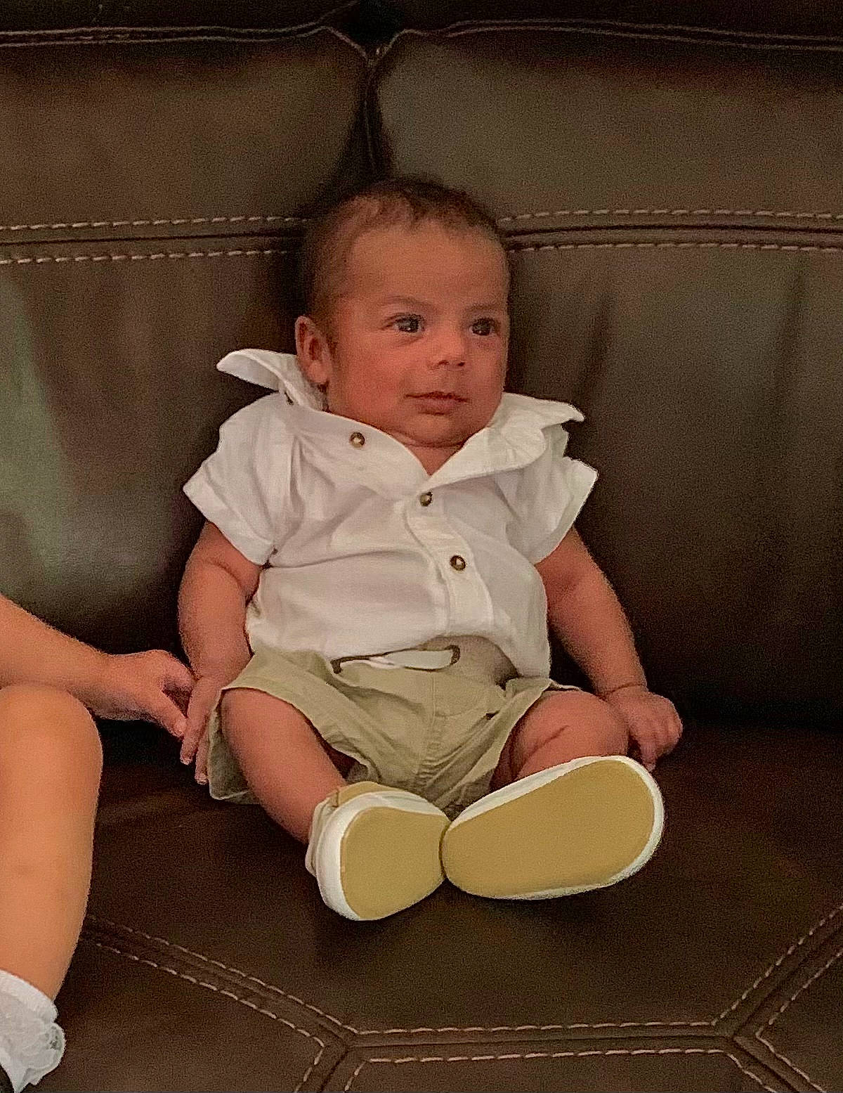 Angel is registered to the contest to win money with this photo: baby, baby_toddler_clothing, chair, cheek, child, comfort, couch, flash_photography, flooring, foot, happy, human_leg, knee, lap, person, room, sitting, sock, thigh, toddler