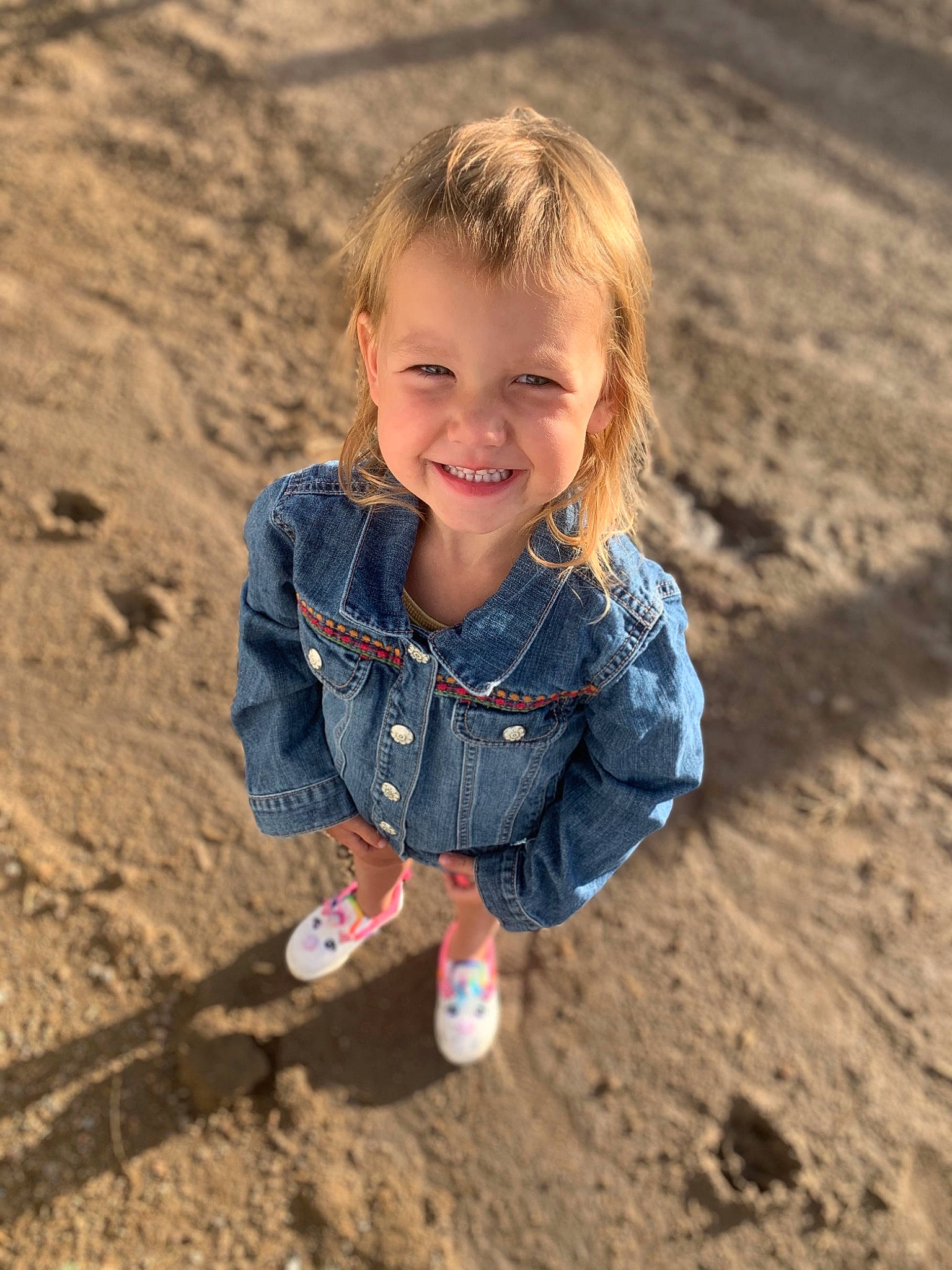 Brooklynn joined the competition — help win amazing prizes! child, denim, fun, happy, jeans, joy, landscape, person, photography, play, sand, sitting, smile, soil, toddler, vacation