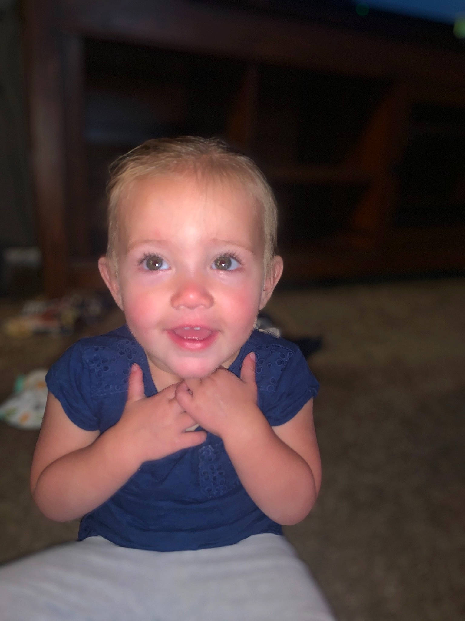 Madalynn is registered to the contest to win money with this photo: arm, blond, blue, cheek, child, chin, eye, face, fun, head, iris, lip, nose, people, person, sitting, skin, smile, standing, toddler