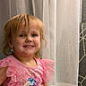 Emberleigh joined the competition — help win amazing prizes! child, girl, pink_dress, smiling, indoor, curtains, cartoon_characters, happy, messy_hair, portrait, person, cute, toddler, clothing, fabric, wall, pattern, young_child, face, fun