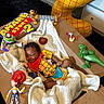 Amare joined the competition — help win amazing prizes! action_figures, baby, birthday, black_rug, blanket, cardboard_box, celebration, child, cute, decor, floor, indoor, inflatable_number, number_two, playful, sleeping, smile, toy_story, toy_toys, woody_costume