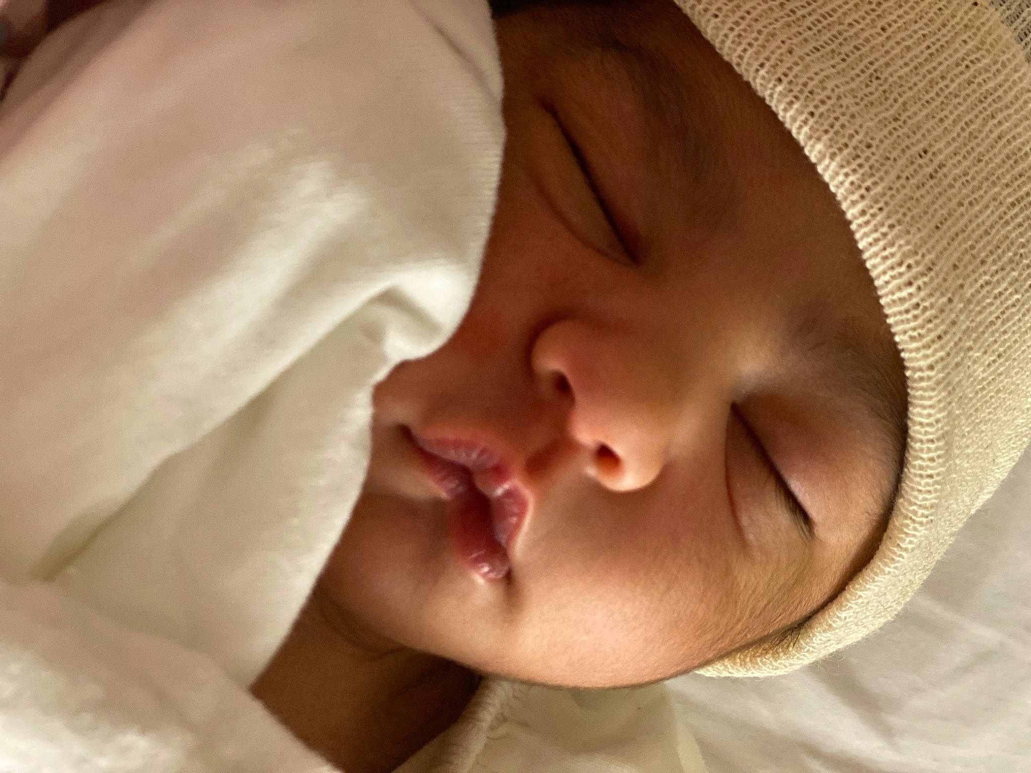 Kamana is registered to the contest to win money with this photo: baby, bedtime, cheek, child, childbirth, close_up, comfort, event, eyebrow, eyelash, happy, headwear, iris, lip, nose, person, portrait_photography, skin, sleep, smile