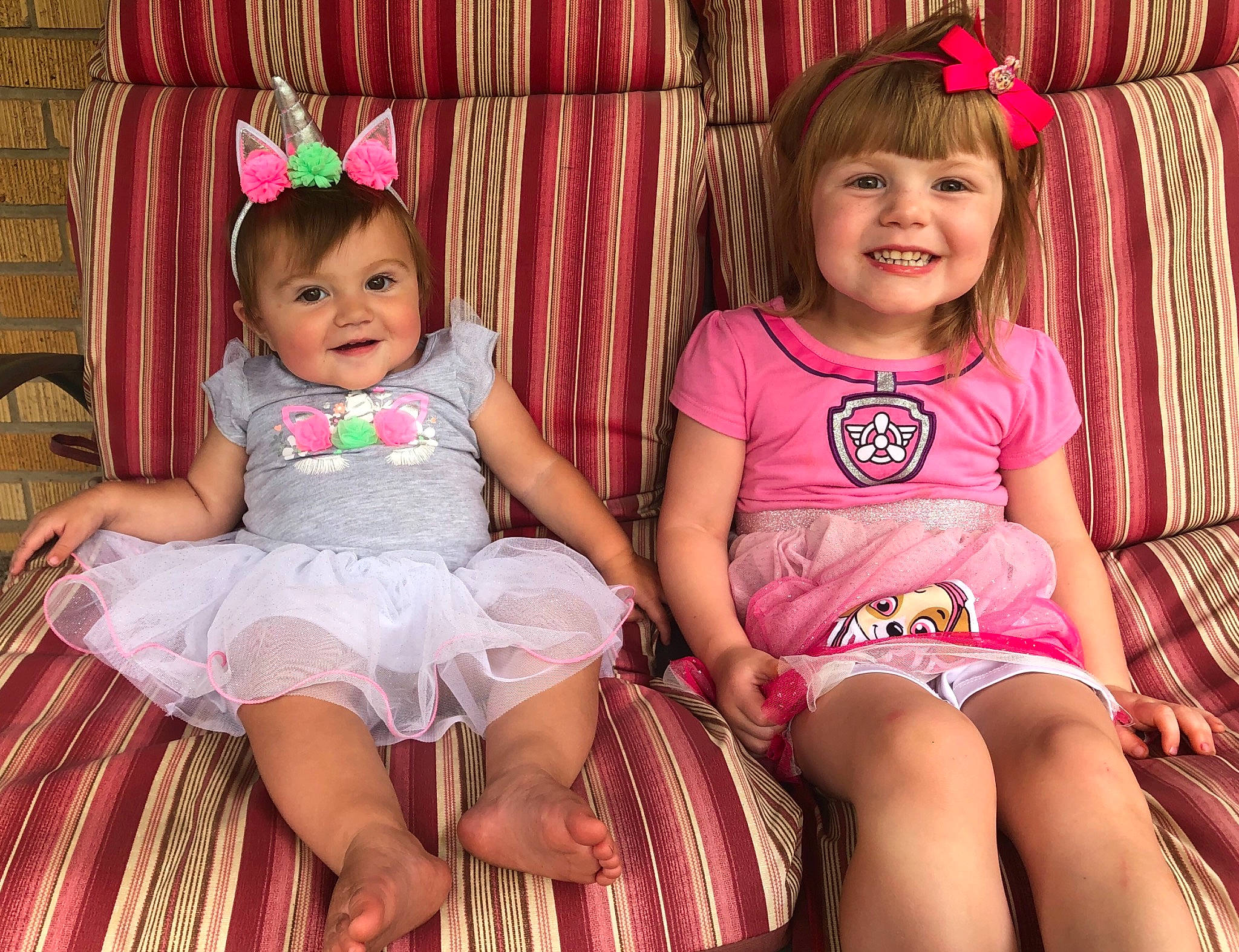 Lenora is registered to the contest to win money with this photo: baby, baby_toddler_clothing, cheek, child, dress, fun, hair_accessory, happy, human, joy, leg, magenta, neck, people, person, photography, pink, product, sitting, skin