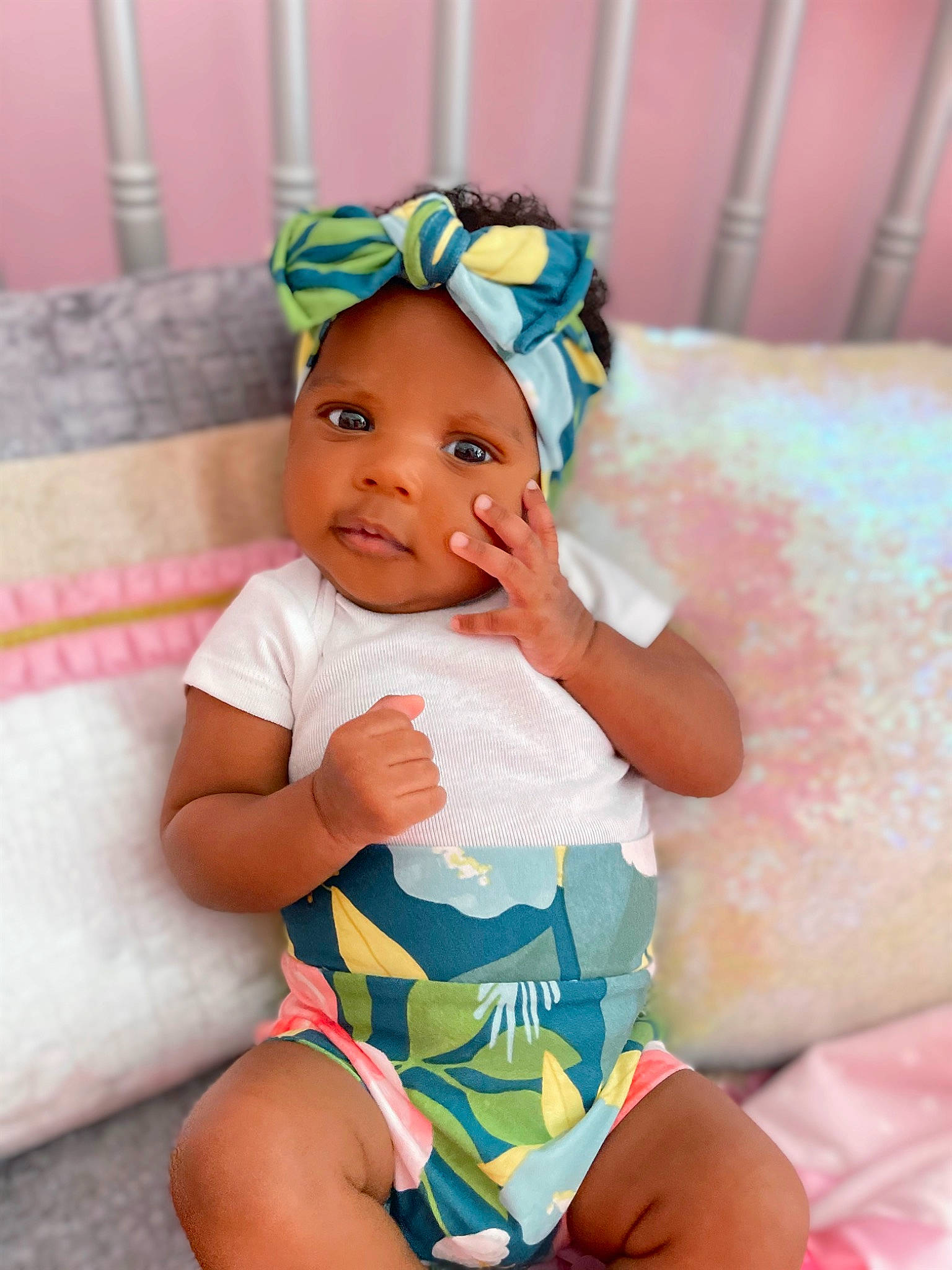 Asha joined the competition — help win amazing prizes! aqua, baby, baby_toddler_clothing, beauty, cap, comfort, eye, face, finger, fun, happy, hat, headband, human_leg, orange, person, pink, skin, smile, thigh