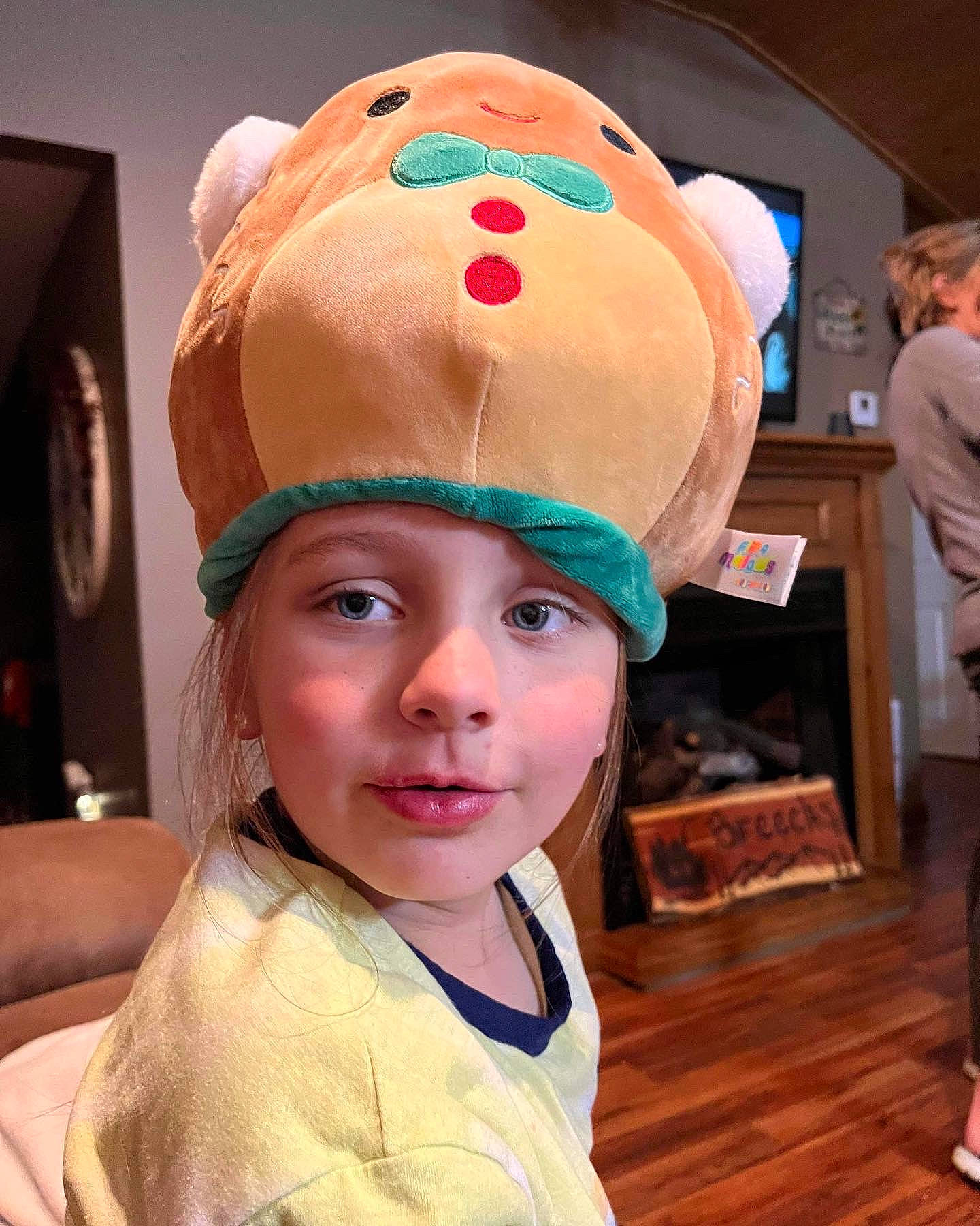 Emerie joined the competition — help win amazing prizes! cap, child, costume, costume_accessory, costume_hat, event, fashion_accessory, flooring, fun, fur, happy, hardwood, headgear, headpiece, headwear, party_supply, person, personal_protective_equipment, room, sports_gear