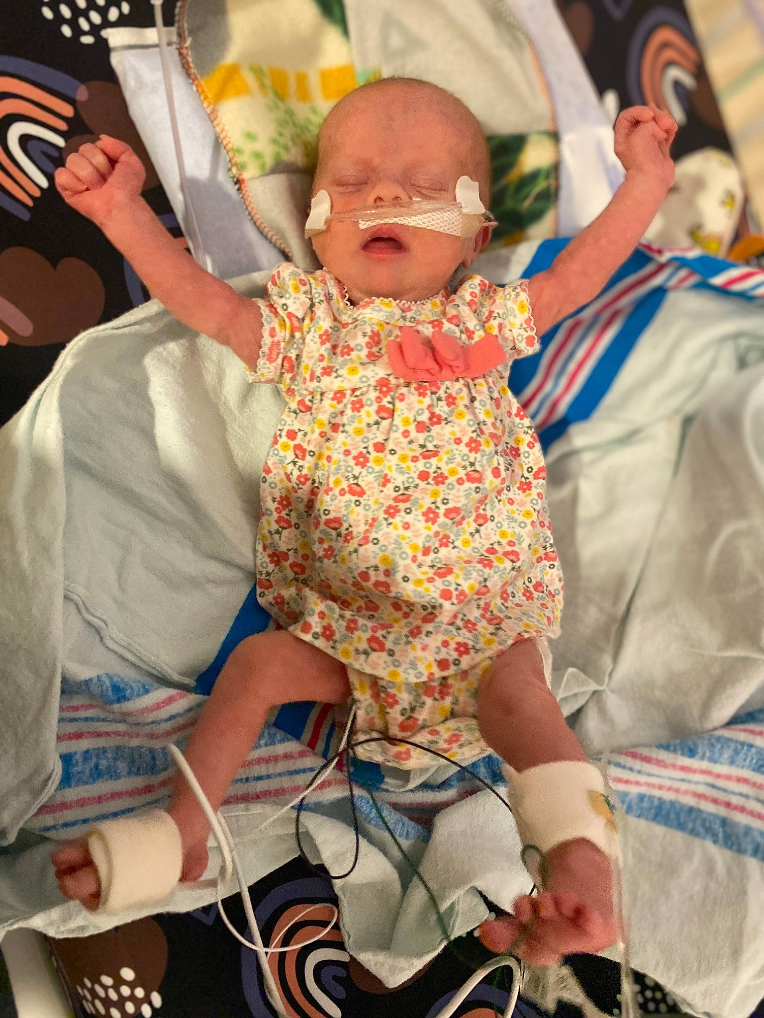 Maizie is registered to the contest to win money with this photo: baby, child, dress, event, fashion, fun, goggles, hairstyle, happy, human_leg, interaction, leg, leisure, person, pink, product, skin, snapshot, sunglasses, thigh