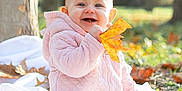 Meïlly participe au concours pour gagner de l'argent avec cette photo : autumn, baby, blanket, child, cute, daylight, fall_leaves, grass, happy, infant, leaf, nature, outdoors, pink_jacket, playful, portrait, seasonal, smiling, tree, young