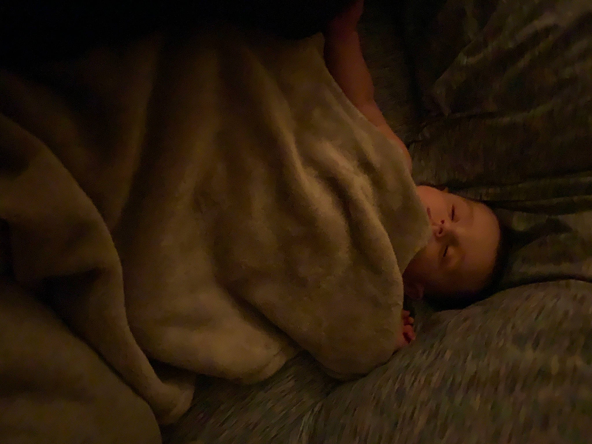 Hunter is registered to the contest to win money with this photo: abdomen, baby, bedding, bedtime, child, comfort, darkness, elbow, flash_photography, flesh, flooring, fur, hardwood, human_leg, linens, nap, person, room, sleep, toddler