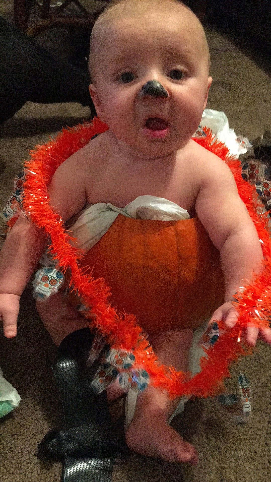Bentley is registered to the contest to win money with this photo: baby, child, flesh, fun, lip, mouth, orange, person, smile, toddler