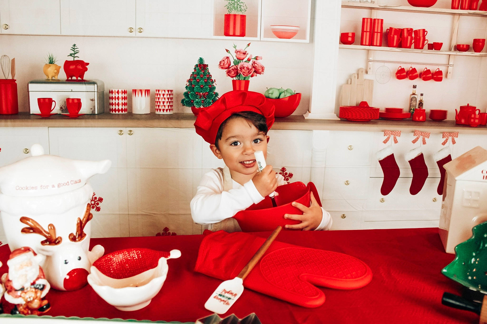 Josiah joined the competition — help win amazing prizes! carmine, christmas_decoration, christmas_eve, costume_hat, decoration, event, happy, hat, holiday, home_appliance, interior_design, joy, ornament, pattern, person, porcelain, red, room, serveware, shelf