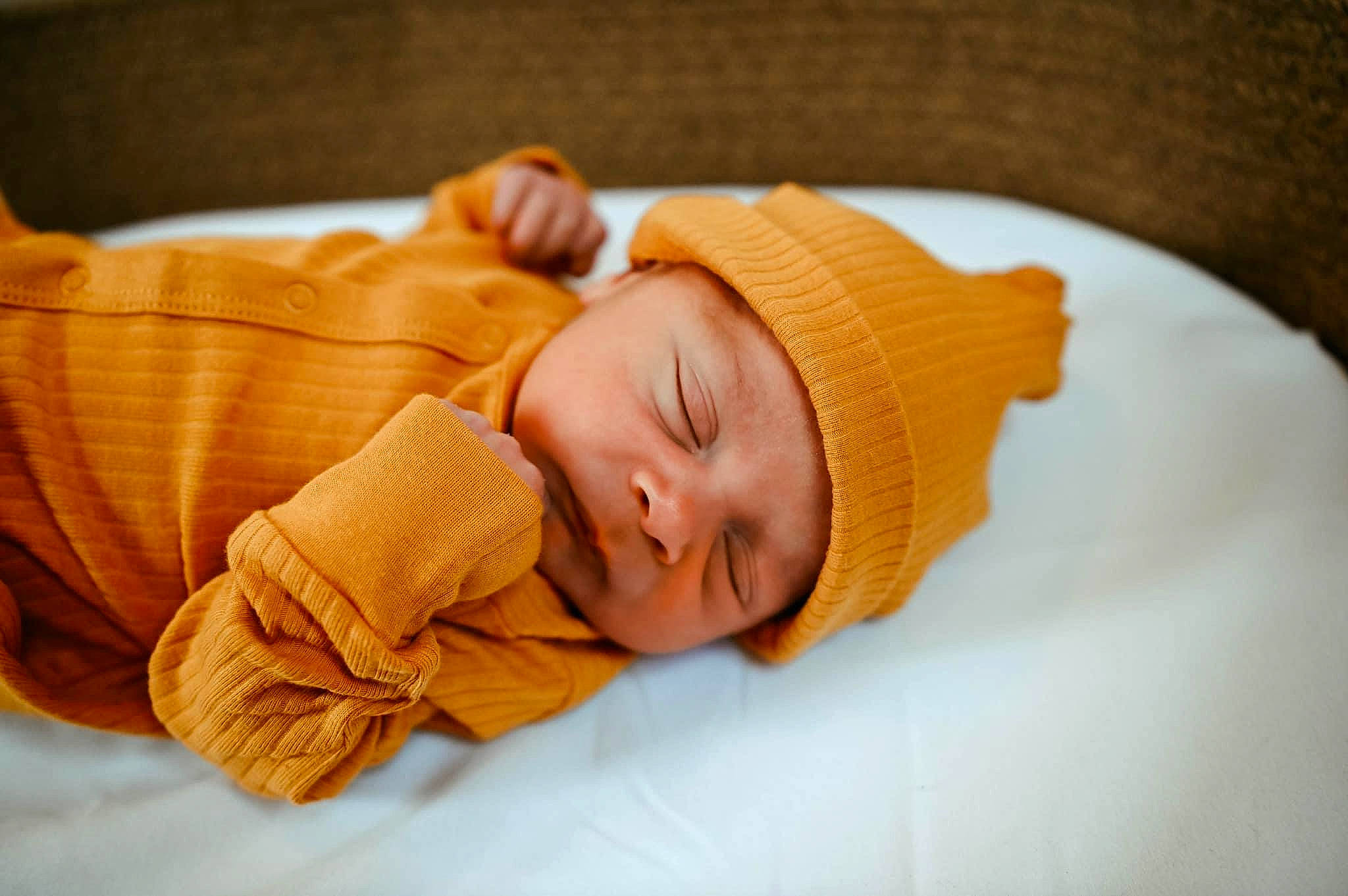Jovan is registered to the contest to win money with this photo: baby, baby_products, baby_safety, baby_sleeping, baby_toddler_clothing, beanie, bedtime, child, comfort, face, headwear, knit_cap, linens, nap, peach, person, portrait_photography, room, sleep, textile