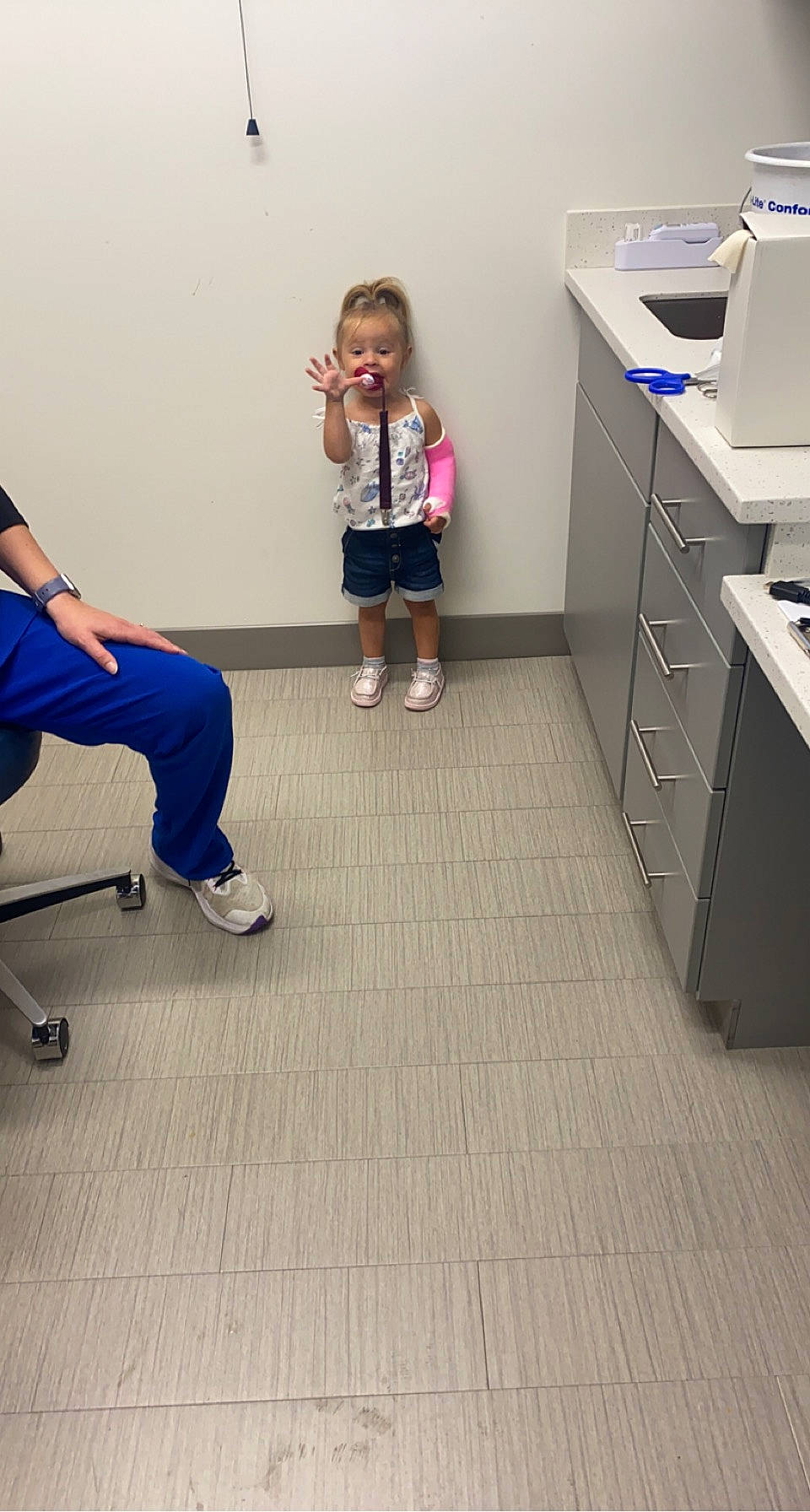 Lynnlee joined the competition — help win amazing prizes! cabinetry, chair, chest_of_drawers, child, desk, drawer, floor, flooring, fun, furniture, hardwood, human_leg, knee, leg, leisure, person, photograph, smile, table, thigh