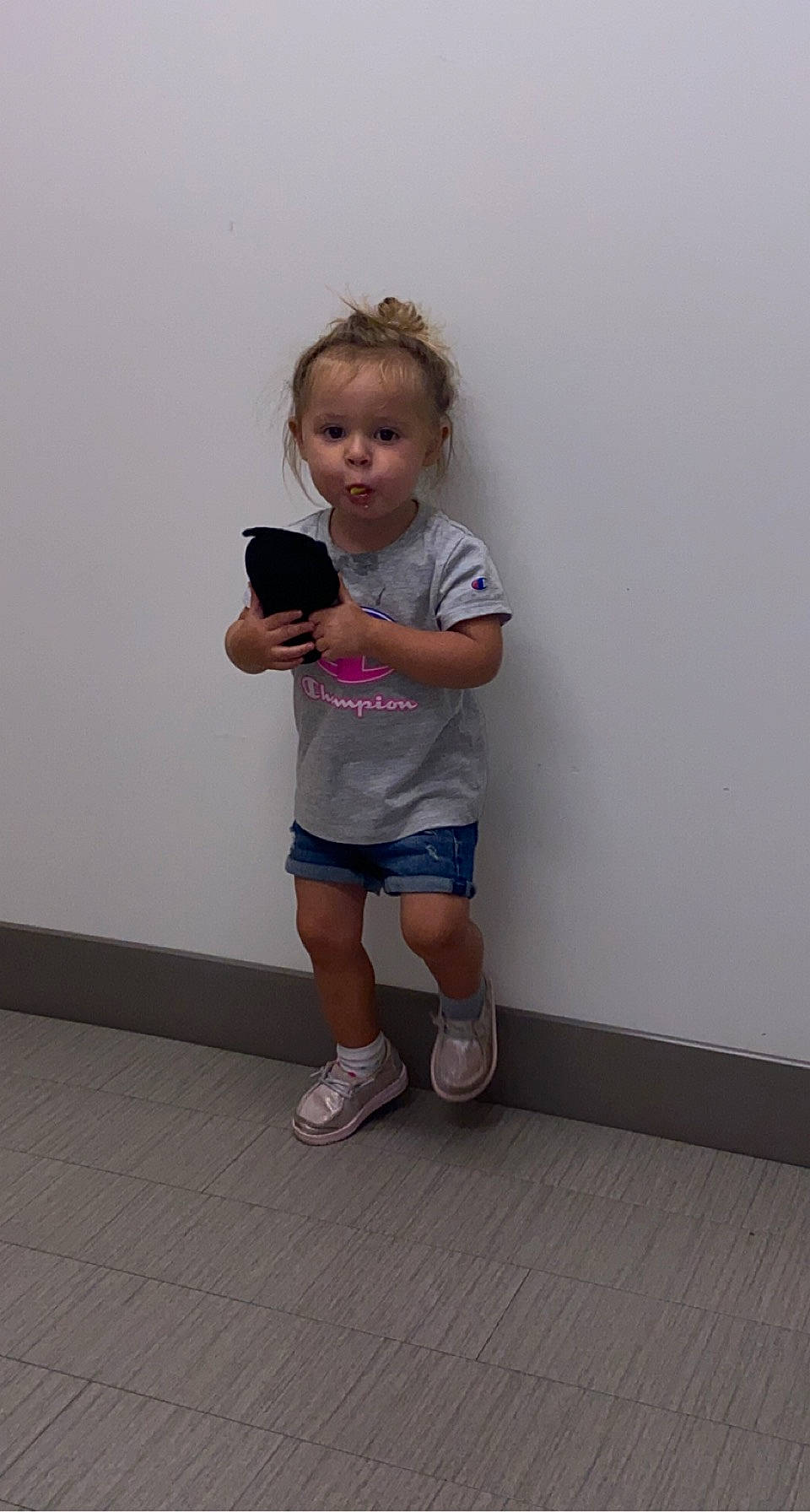 Lynnlee is registered to the contest to win money with this photo: child, elbow, electric_blue, flooring, footwear, fun, happy, human_leg, knee, person, room, sandal, shorts, sleeve, sneakers, sock, sportswear, t_shirt, thigh, thumb