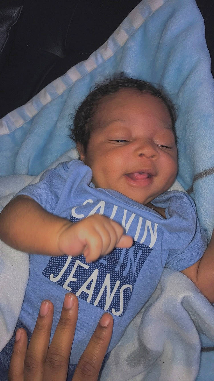 Masiyah is registered to the contest to win money with this photo: arm, baby, baby_products, bedtime, birth, cheek, child, facial_expression, finger, gesture, hand, lip, nap, nose, person, product, skin, sleep, smile, thumb