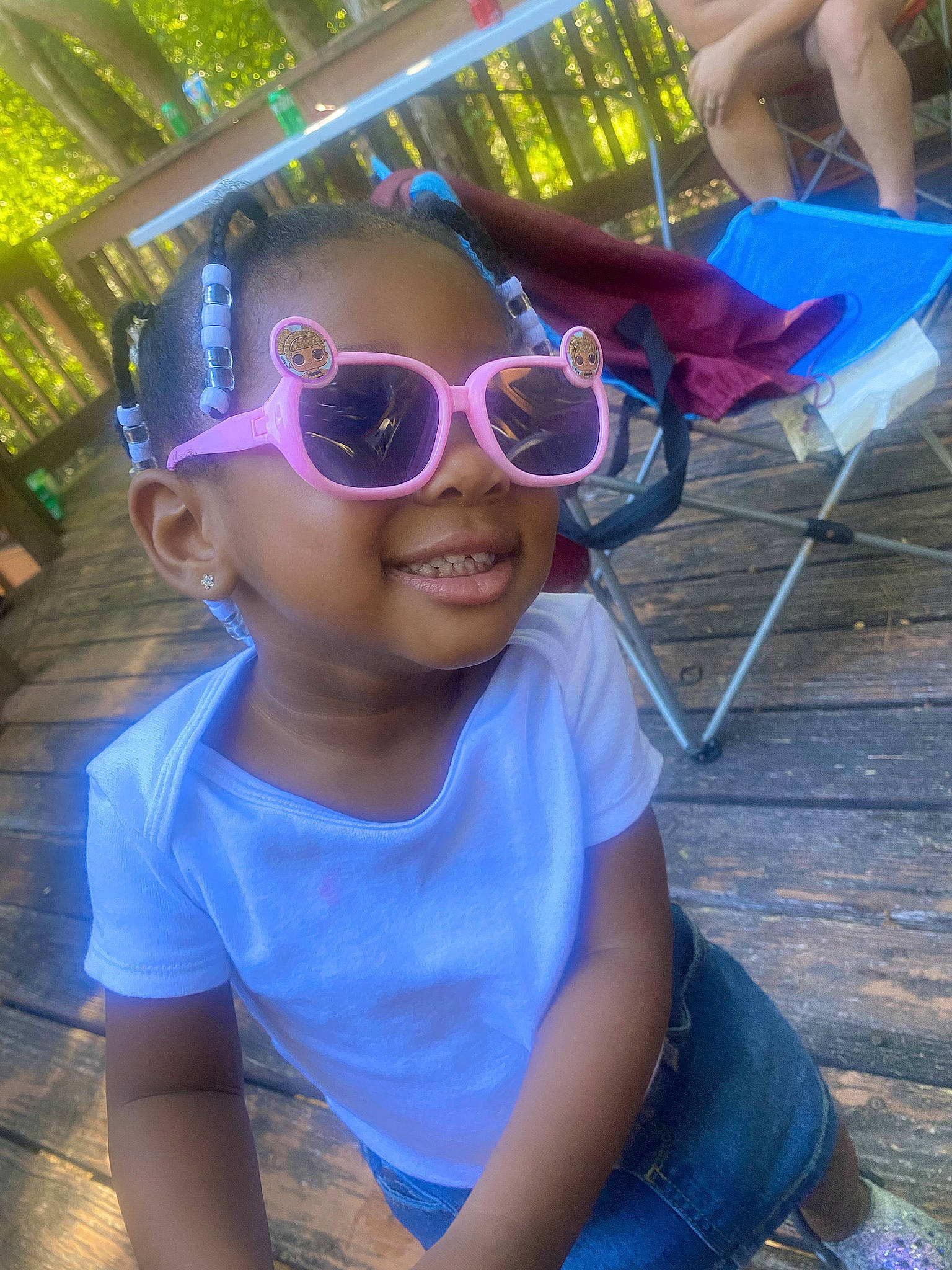 Khalani joined the competition — help win amazing prizes! blue, cool, electric_blue, eyewear, fun, gadget, goggles, grass, happy, helmet, joy, leisure, magenta, person, personal_protective_equipment, plant, purple, recreation, smile, toddler
