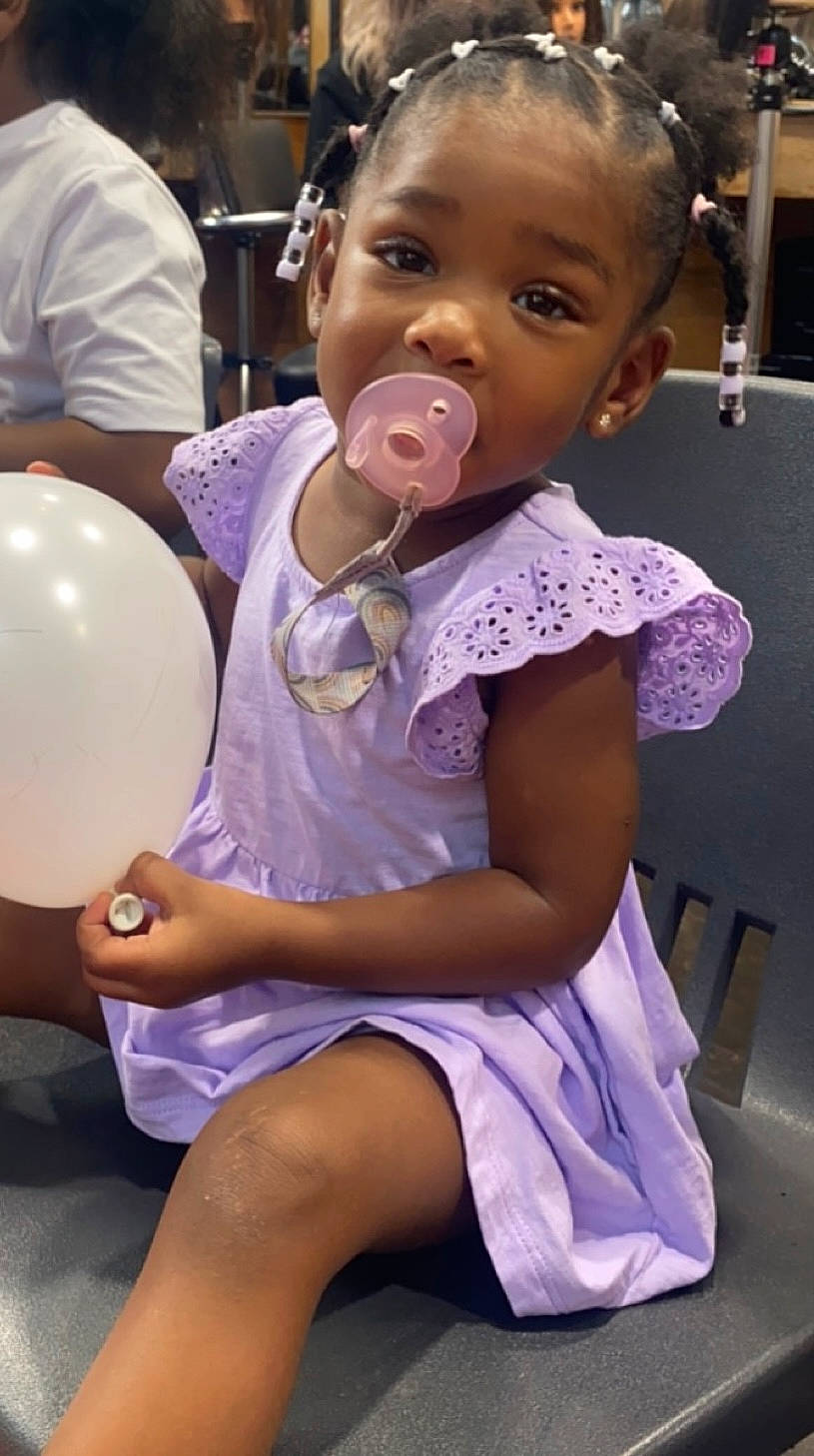 Khalani joined the competition — help win amazing prizes! baby, baby_toddler_clothing, balloon, cheek, child, ear, event, finger, fun, happy, human_leg, joint, organ, person, pink, purple, skin, thigh, toddler, white