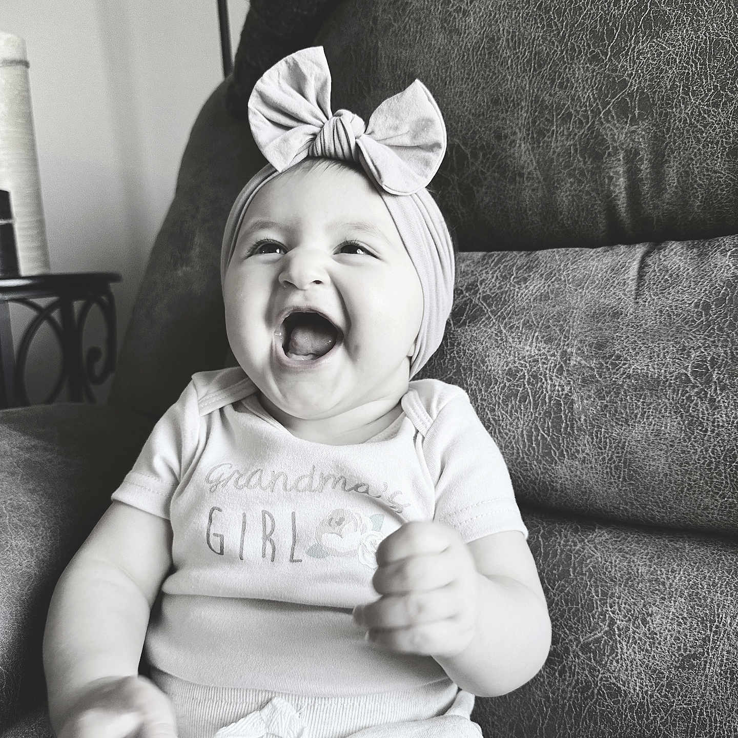 Lilly-Jo is registered to the contest to win money with this photo: architecture, baby, babylaughing, building, clothing, couch, cushion, face, furniture, happy, head, homedecor, indoors, laughing, livingroom, person, photography, portrait, room, smile