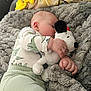 Waylon is registered to the contest to win money with this photo: baby, sleeping, plush_toy, snoopy, blanket, cozy, soft_texture, child, infant, cute, resting, clothing, pajamas, hand, face, nap, indoor, comfort, peaceful, cuddling