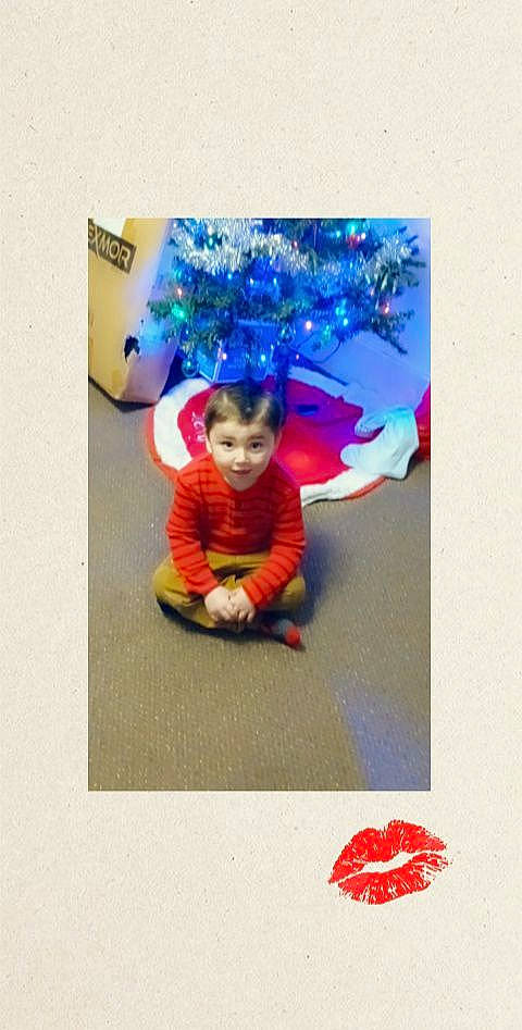 Bryce is registered to the contest to win money with this photo: art, baby, baby_toddler_clothing, carmine, child, electric_blue, fictional_character, font, fun, happy, holiday, illustration, magenta, person, play, rectangle, room, sitting, sleeve, t_shirt