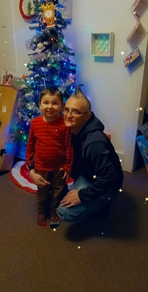 Bryce joined the competition — help win amazing prizes! child, christmas, christmas_decoration, christmas_ornament, christmas_tree, conifer, event, fun, happy, holiday, holiday_ornament, joy, lap, leisure, ornament, person, picture_frame, room, smile, standing