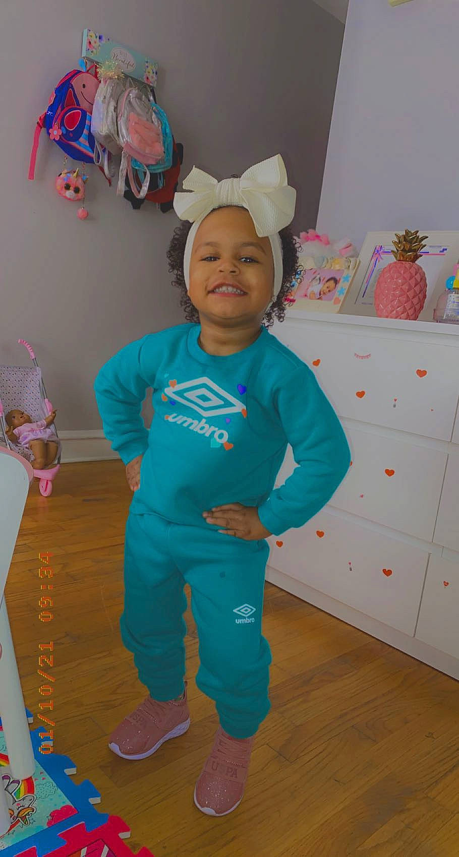 Madelynn is registered to the contest to win money with this photo: baby, baby_toddler_clothing, child, costume, event, fictional_character, flooring, fun, happy, joy, linens, paper_product, person, pink, play, room, sleeve, smile, stuffed_toy, t_shirt