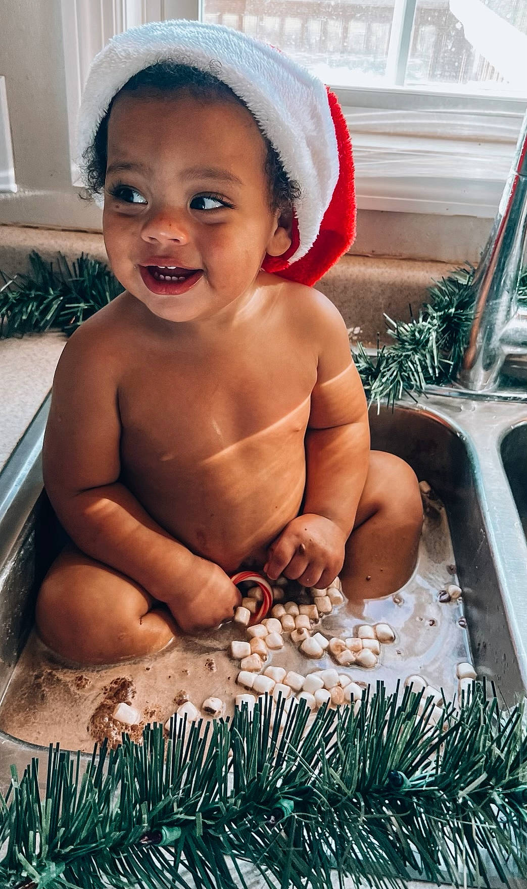 Jamarion is registered to the contest to win money with this photo: baby, barechested, bathing, beauty, blue, cap, chest, child, event, eyebrow, face, fun, grass, happy, ingredient, leisure, people, person, skin, smile