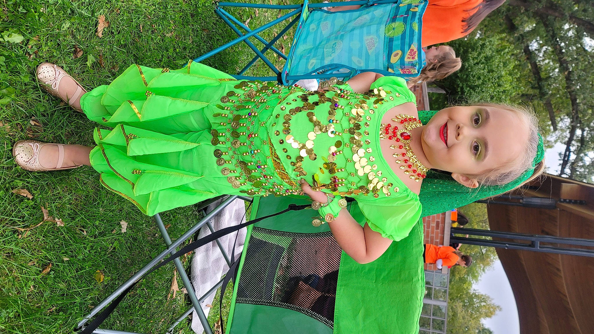 Alyanna is registered to the contest to win money with this photo: baby_toddler_clothing, chair, child, clothing, event, fun, grass, green, happy, hat, joy, leisure, pattern, people_in_nature, person, plant, recreation, sandal, smile, t_shirt