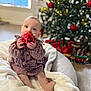 baby, biting, blanket, christmas, christmasdecorations, christmastree, face, festival, head, person, photography, portrait, sitting, yawning