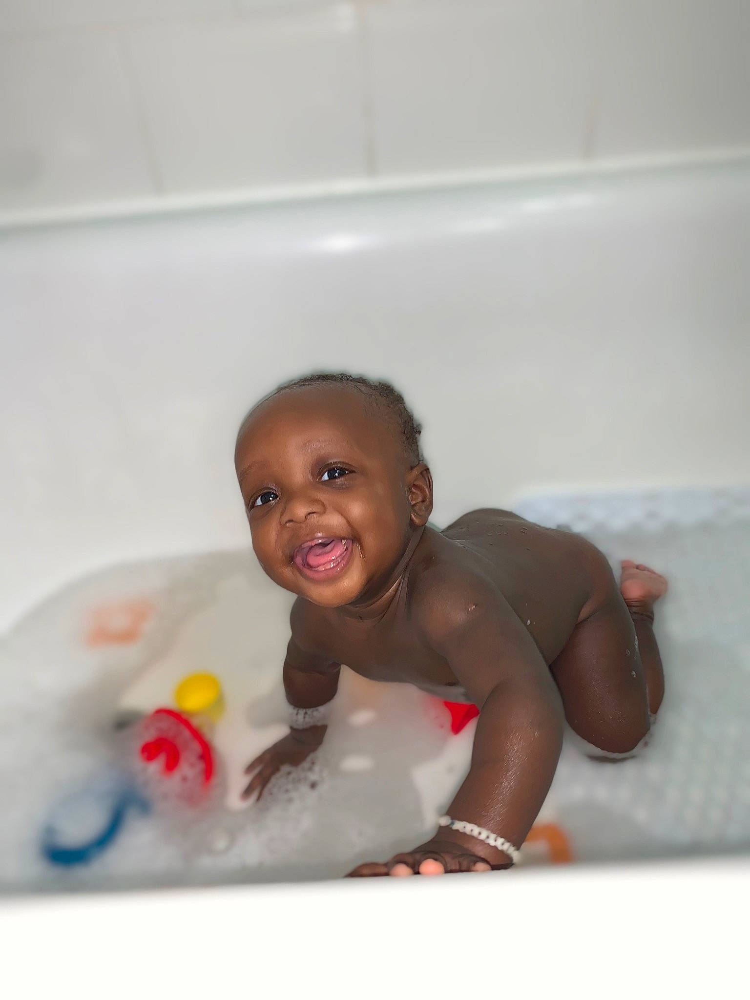 Jaziah joined the competition — help win amazing prizes! baby, baby_bathing, bath_toy, bathing, bathroom, bathtub, brown, child, fluid, foam, fun, joy, leisure, liquid, person, plumbing, plumbing_fixture, room, smile, tap