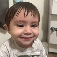 Paul joined the competition — help win amazing prizes! toddler, child, smile, wet_hair, shirt, vehicle_design, indoor, face, young_child, happy, person, portrait, clothing, floor, cabinet, towel, bathroom, cute, expression, head