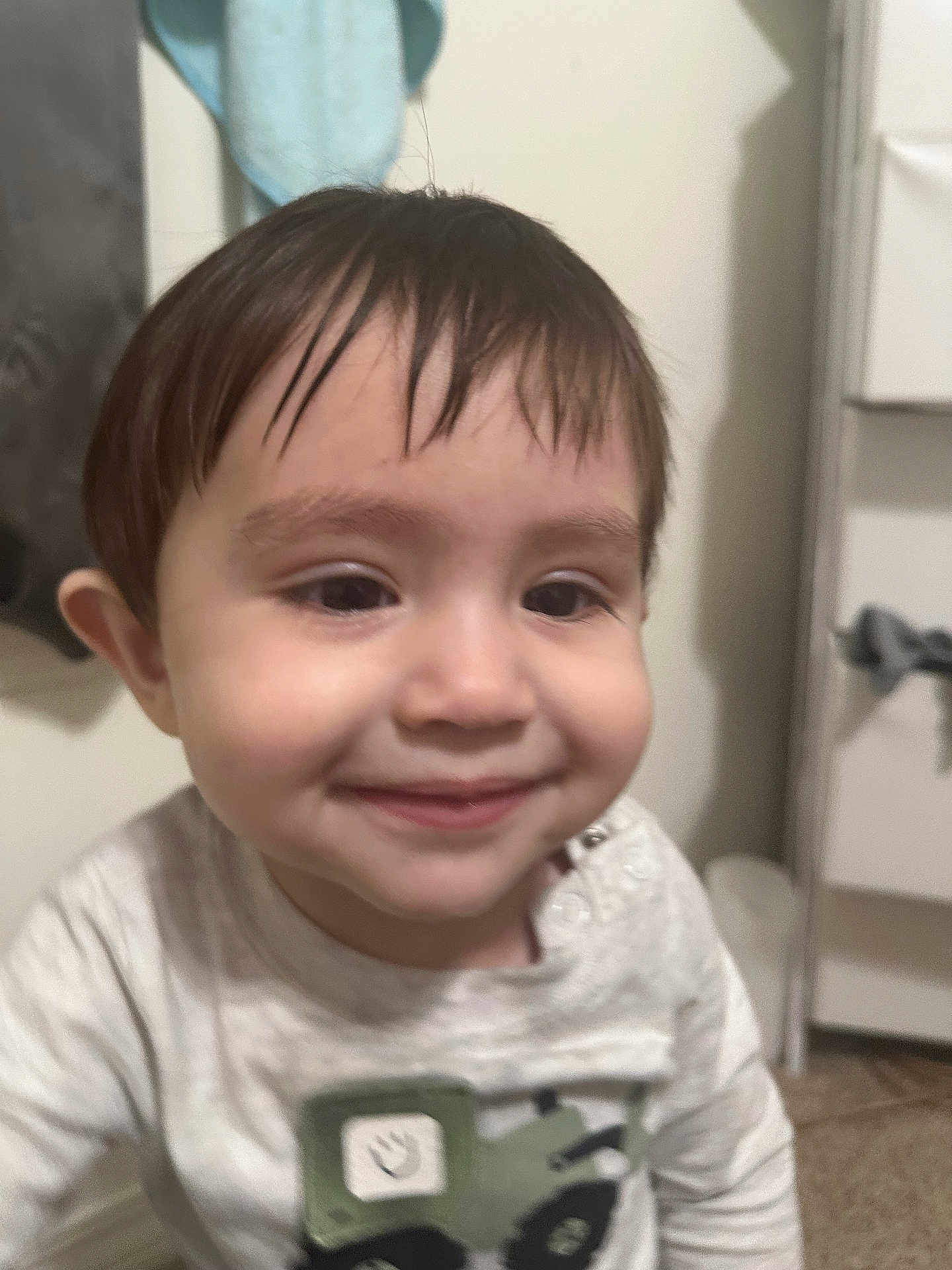 Paul joined the competition — help win amazing prizes! toddler, child, smile, wet_hair, shirt, vehicle_design, indoor, face, young_child, happy, person, portrait, clothing, floor, cabinet, towel, bathroom, cute, expression, head