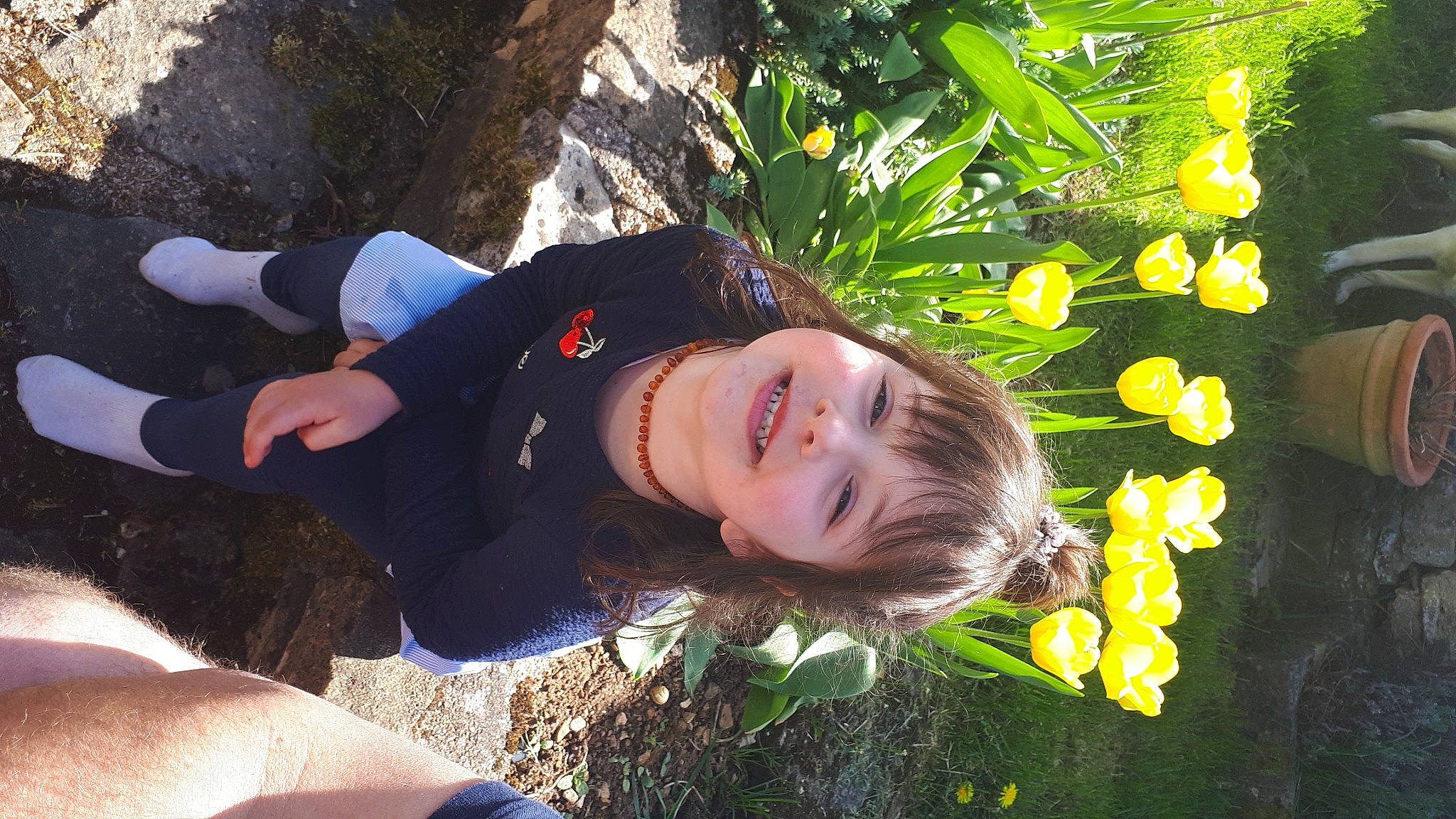 Emma participe au concours pour gagner de l'argent avec cette photo : child, cool, electric_blue, flash_photography, fun, grass, happy, joy, laugh, leisure, people_in_nature, person, petal, plant, portrait_photography, recreation, sitting, smile, spring, vacation