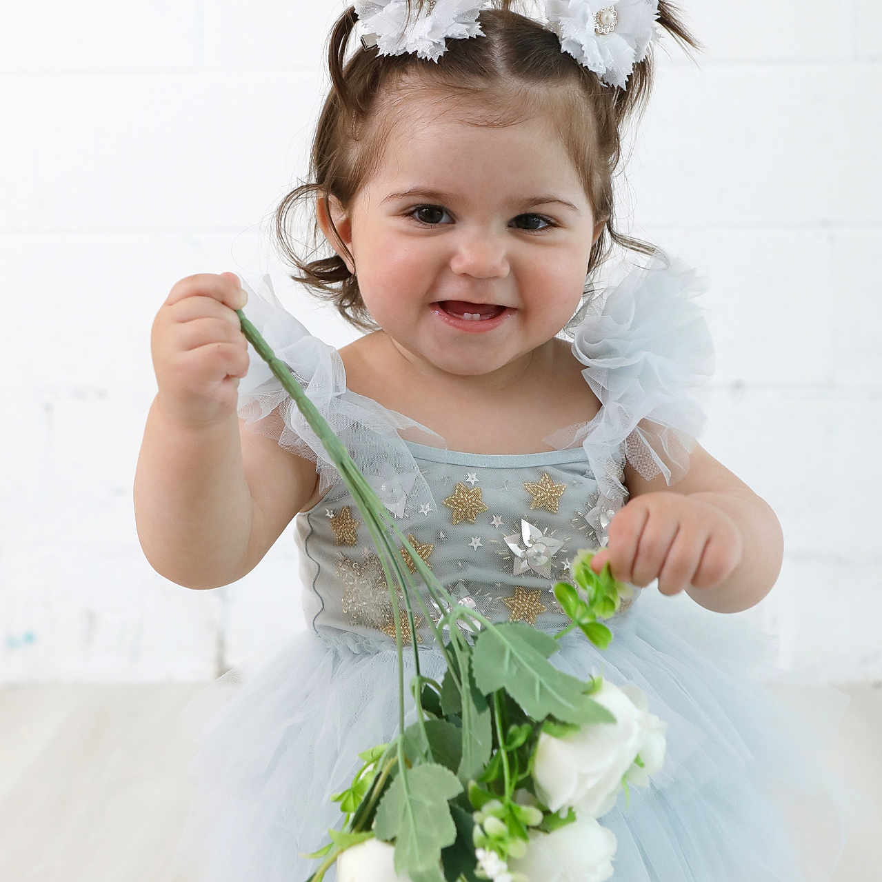 Aruru joined the competition — help win amazing prizes! baby, bodypart, clothing, dress, face, finger, flower, flowerarrangement, flowerbouquet, formalwear, hand, head, leaf, pattern, person, petal, photography, plant, portrait, rose