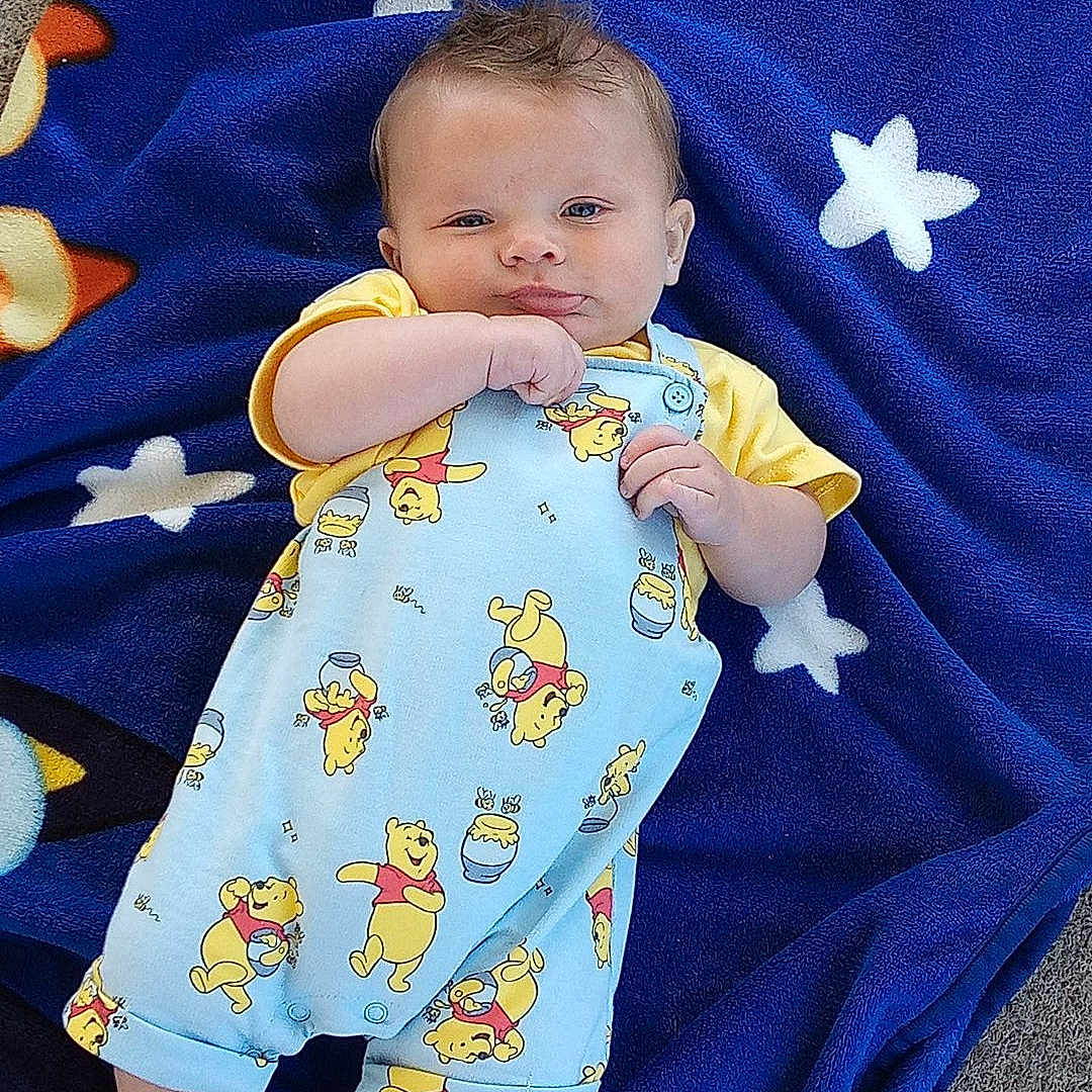 Vyxin joined the competition — help win amazing prizes! baby, infant, blanket, blue_blanket, stars, winnie_the_pooh, clothing, onesie, cute, lying_down, outdoor, footwear, smiling, face, head, hand, feet, person, toddler, playful