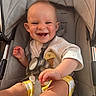 Tommy joined the competition — help win amazing prizes! baby, babywearing, child, clothing, cute, fabric, foot, hand, happy, ice_cream_patch, indoors, infant, person, portrait, seat, seatbelt, smiling, stroller, sunlight, yellow_shorts